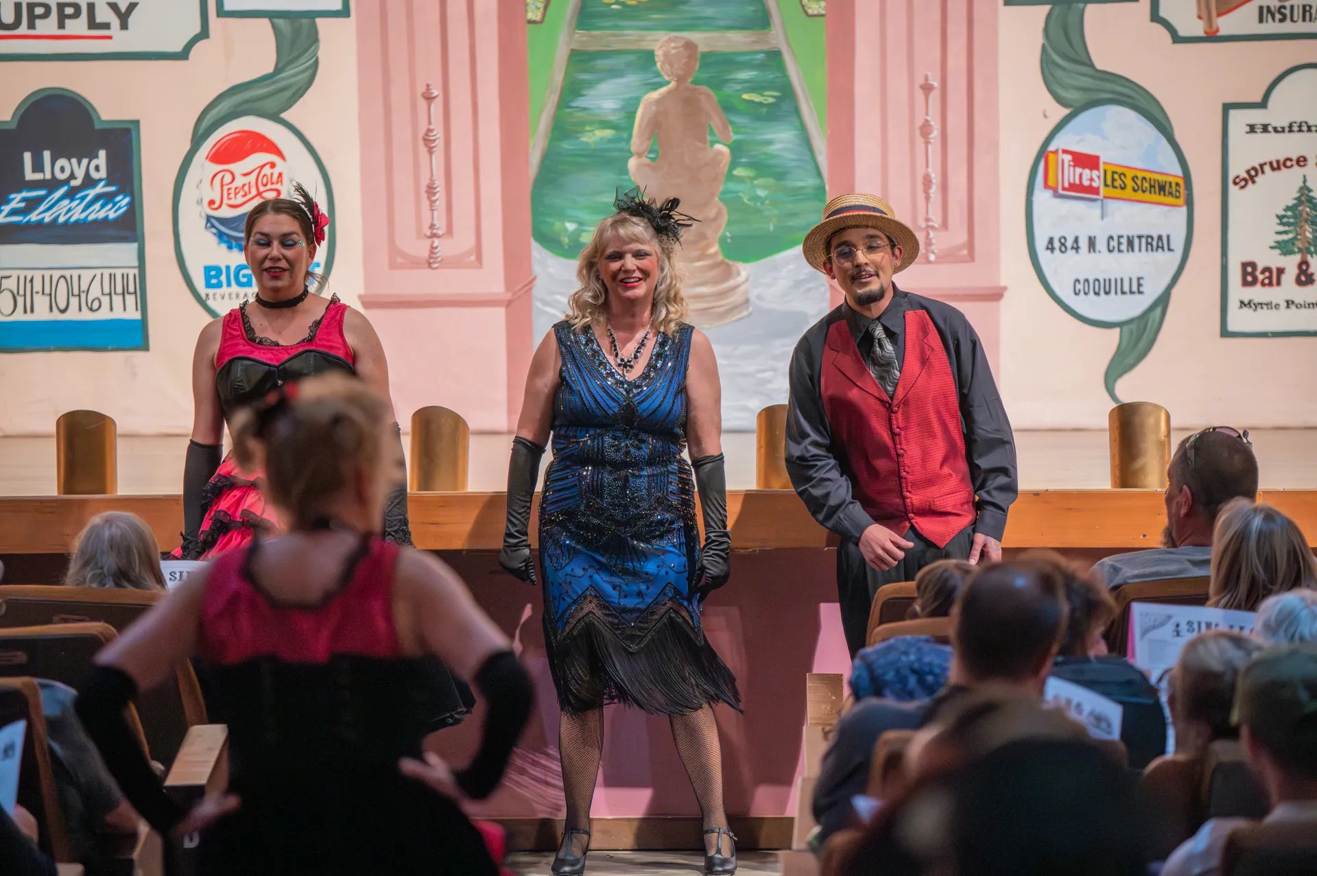 Stage performers in vintage costumes